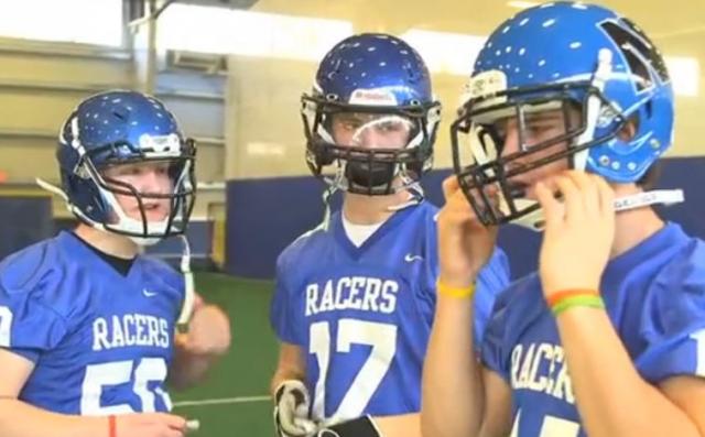 Newcastle Racers wearing three different football helmets