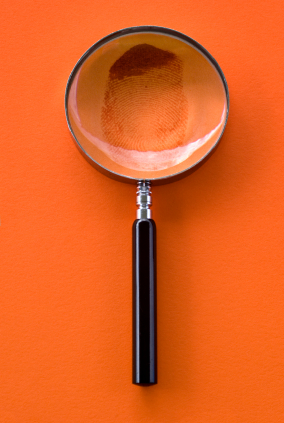 Magnifying glass on a fingerprint