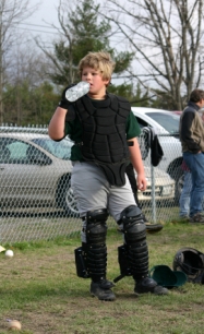 Baseball catcher drinking water