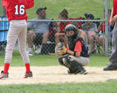 Baseball catcher getting sign