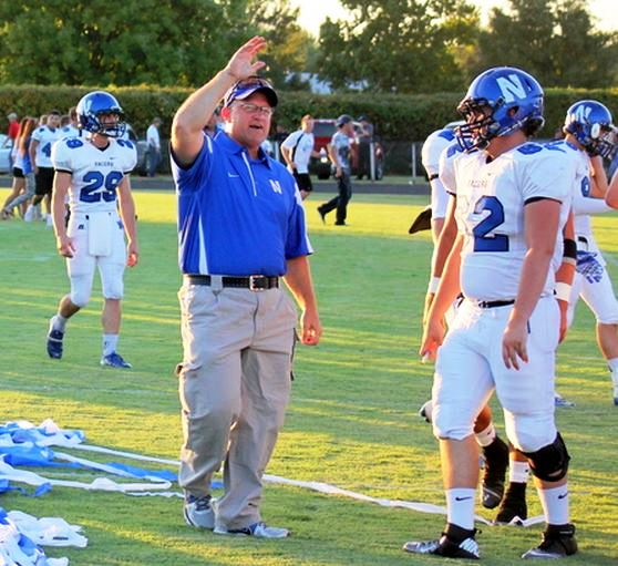 Newcastle High football coach Keith Bolles and player