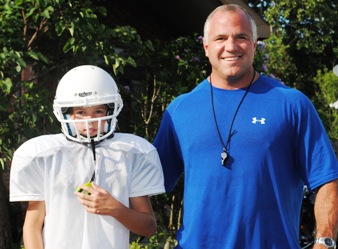 Dan Nicholson and son Matt in football uniform