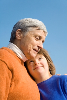 Grandfather with grandson with Downe's Syndrome