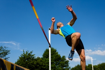 High jumper going over the bar