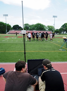 Purdue researchers monitoring hits on sideline of football practice