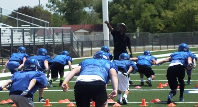 Bobby Hosea teaching proper tackling