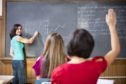 Teacher at blackboard