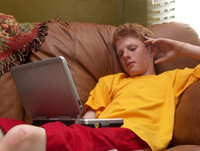 Boy playing on computer