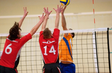 Volleyball players at the net