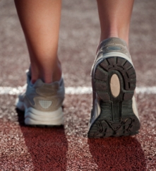 Runner walking on track