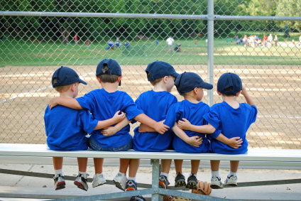 Little League baseball teammates