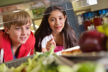 Children at school lunch counter